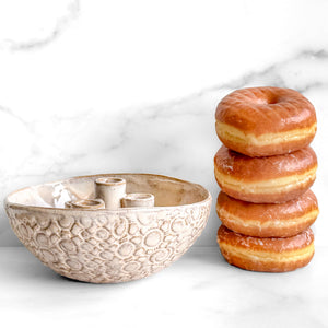 Flower frog vessel by Shannon Kelly x Orphan Ten with donuts for scale
